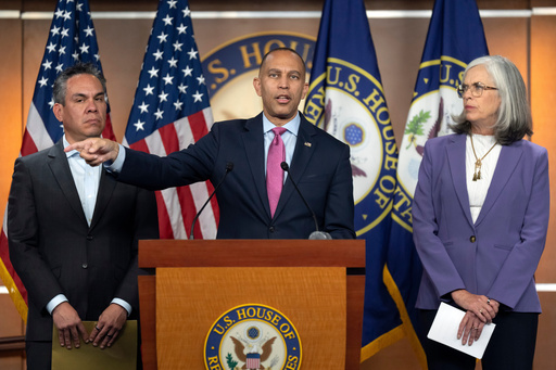 House Minority Leader Hakeem Jeffries, of N.Y., center, speaks as House Democratic Caucus Chairman Rep. Pete Aguilar, D-Calif., left, and House Minority Whip Rep. Katherine Clark, D-Mass., right, listen during a press conference on Capitol Hill on Wednesday, Oct. 1, 2025, in Washington. (AP Photo/Mark Schiefelbein) House Minority Leader Hakeem Jeffries, of N.Y., center, speaks as House Democratic Caucus Chairman Rep. Pete Aguilar, D-Calif., left, and House Minority Whip Rep. Katherine Clark, D-Mass., right, listen during a press conference on Capitol Hill on Wednesday, Oct. 1, 2025, in Washington. (AP Photo/Mark Schiefelbein)