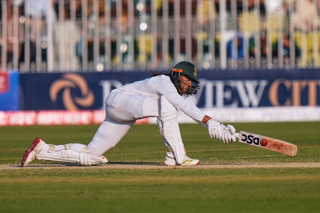 South Africa's Tony de Zorzi plays a shot during the second day of the second test cricket match between Pakistan and South Africa, in Rawalpindi, Pakistan, Tuesday, Oct. 21, 2025. (AP Photo/Anjum Naveed)