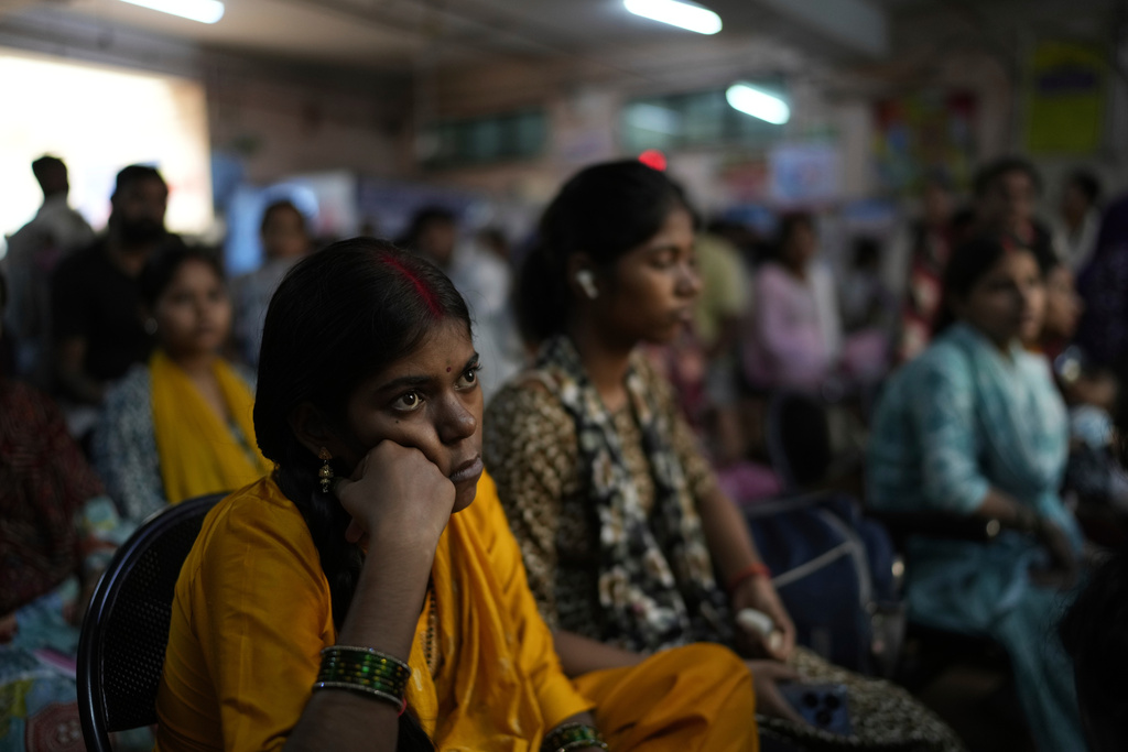 Pregnant women listen to a nurse giving antenatal Care Companion Program (CCP) training at a government hospital in Gurugram, a satellite city of New Delhi, India, on Aug. 7, 2025. (AP Photo/Manish Swarup)