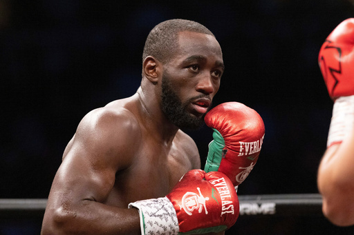 FILE - Terence "Bud" Crawford, left, fights David Avanesyan during a WBO welterweight title boxing bout on Saturday, Dec. 10, 2022, in Omaha, Neb. AP Photo/Rebecca S. Gratz, File) FILE - Terence "Bud" Crawford, left, fights David Avanesyan during a WBO welterweight title boxing bout on Saturday, Dec. 10, 2022, in Omaha, Neb. AP Photo/Rebecca S. Gratz, File)