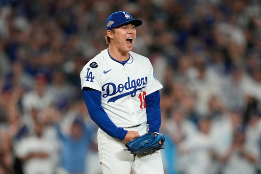 Los Angeles Dodgers pitcher Yoshinobu Yamamoto reacts after striking out Cincinnati Reds' Elly De La Cruz during the sixth inning in Game 2 of the National League Wild Card baseball playoff series Wednesday, Oct. 1, 2025, in Los Angeles. (AP Photo/Mark J. Terrill) Los Angeles Dodgers pitcher Yoshinobu Yamamoto reacts after striking out Cincinnati Reds' Elly De La Cruz during the sixth inning in Game 2 of the National League Wild Card baseball playoff series Wednesday, Oct. 1, 2025, in Los Angeles. (AP Photo/Mark J. Terrill)