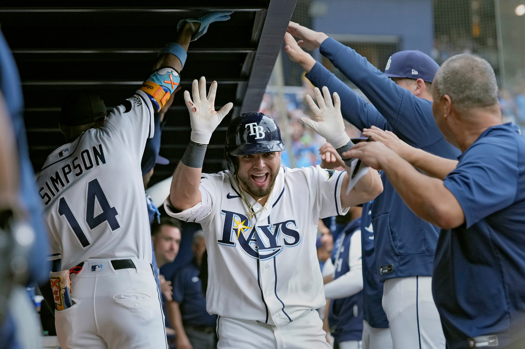 Tampa Bay Rays' Jonathan Aranda, center, celebrates his home run off Houston Astros pitcher Enyel De Los Santos during the fourth inning of a baseball game Sunday, Sept. 13, 2026, in St. Petersburg, Fla. (AP Photo/Chris O'Meara)