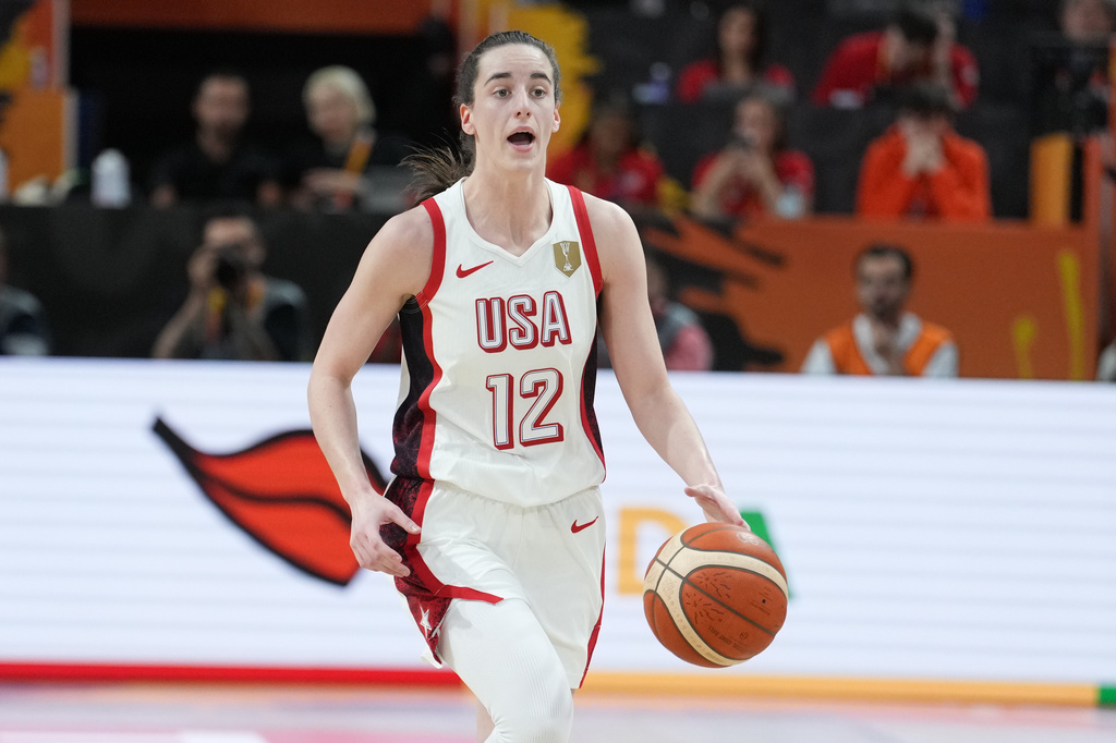United States' Caitlin Clark dribbles during the Women's Basketball World Cup match between China and the United States in Berlin, Friday, Sept. 4, 2026. (AP Photo/Ebrahim Noroozi)