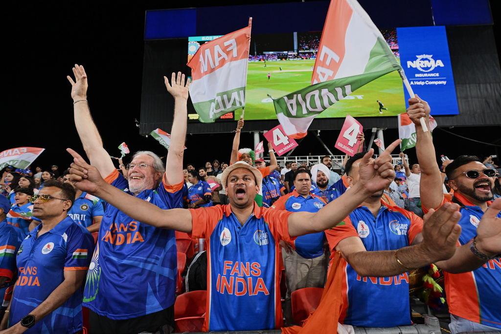 Indian supporters react during a T20 cricket international between India and Australia in Carrara, Australia, Thursday, Nov. 6, 2025. (Dave Hunt/AAPImage via AP)
