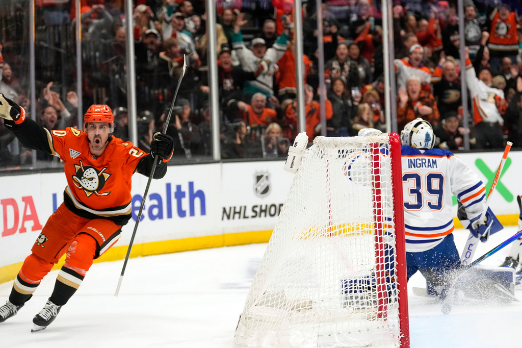 Anaheim Ducks left wing Chris Kreider, left, celebrates his goal on Edmonton Oilers goaltender Connor Ingram, right, during the first period of Game 6 in the first round of the NHL hockey Stanley Cup playoffs series, Thursday, April 30, 2026, in Anaheim, Calif. (AP Photo/Mark J. Terrill)