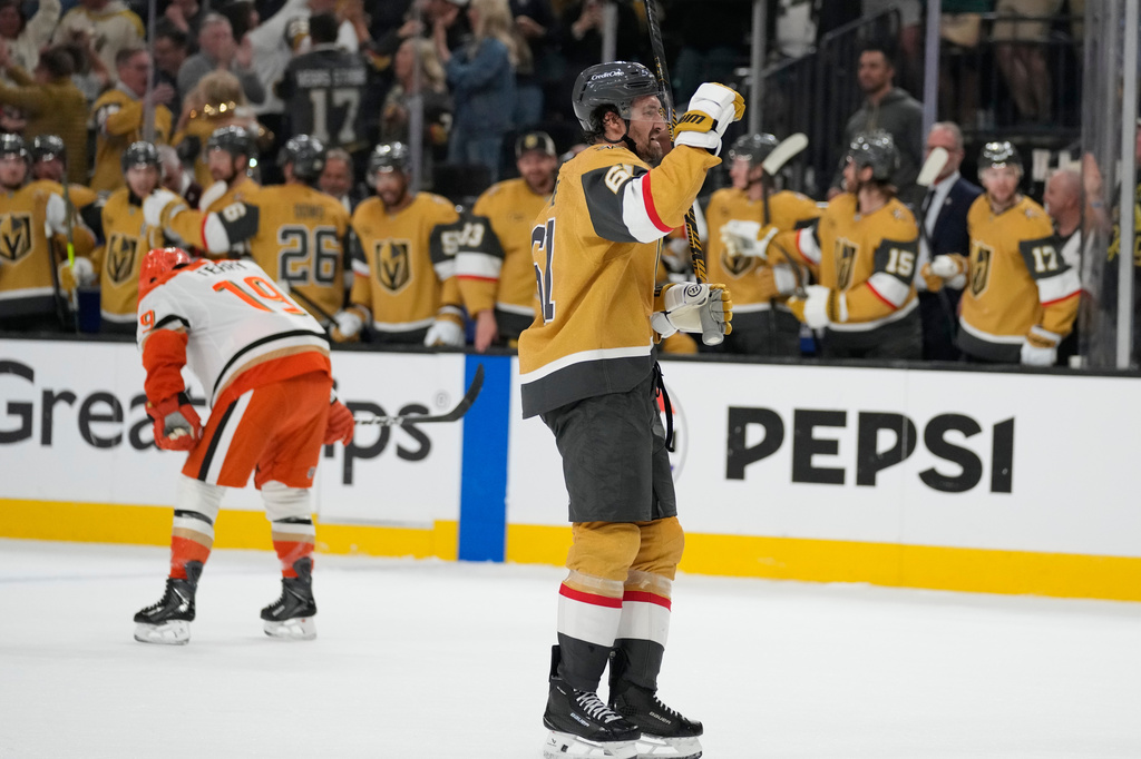 Vegas Golden Knights right wing Mark Stone (61) celebrates after a goal by Vegas Golden Knights right wing Mitch Marner during the third period of Game 1 of a second-round NHL hockey Stanley Cup playoff series Monday, May 4, 2026, in Las Vegas. (AP Photo/John Locher)