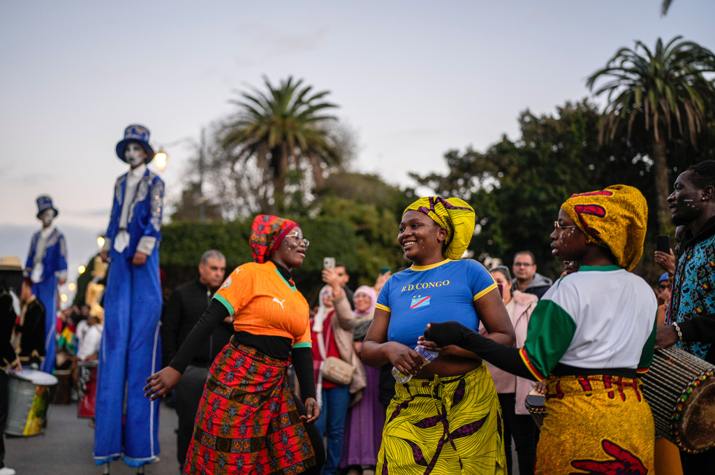 People take part in a parade celebrating the upcoming Africa Cup of Nations soccer competition, in Rabat, Morocco, Saturday, Dec. 20, 2025. (AP Photo/Mosa'ab Elshamy)