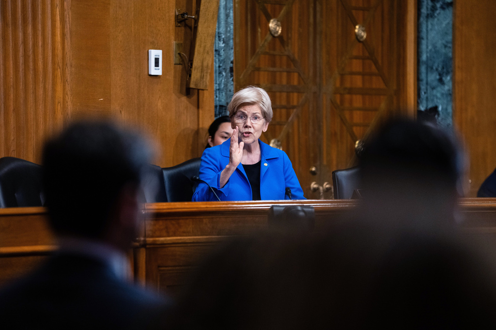 Sen. Elizabeth Warren, D-Mass., asks questions following Treasury Secretary Scott Bessent's testimony before the Senate Committee on Finance hearing to examine the President's proposed budget request for fiscal year 2027, Wednesday, June 3, 2026 in Washington. (AP Photo/Allison Robbert)