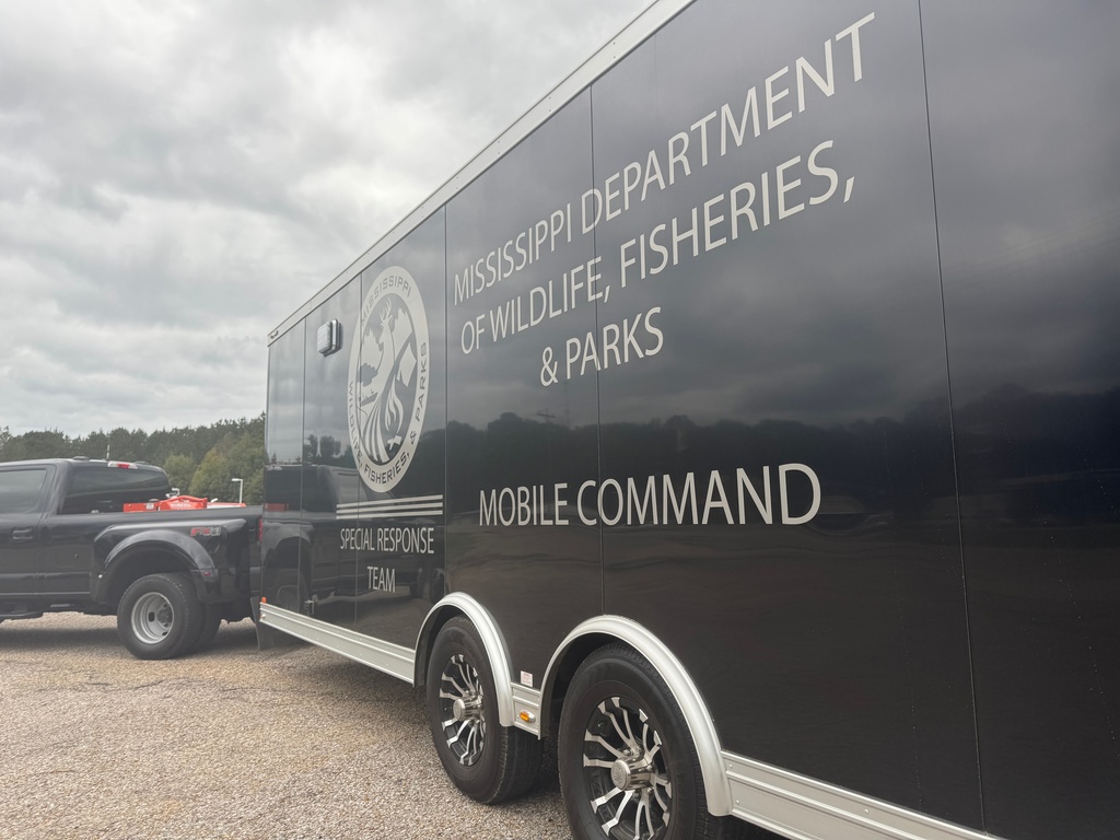 The Mississippi Department of Wildlife, Fisheries and Parks set up a mobile command in Heidelberg, Miss. on Oct. 25, 2025. (AP Photo/Sophie Bates)