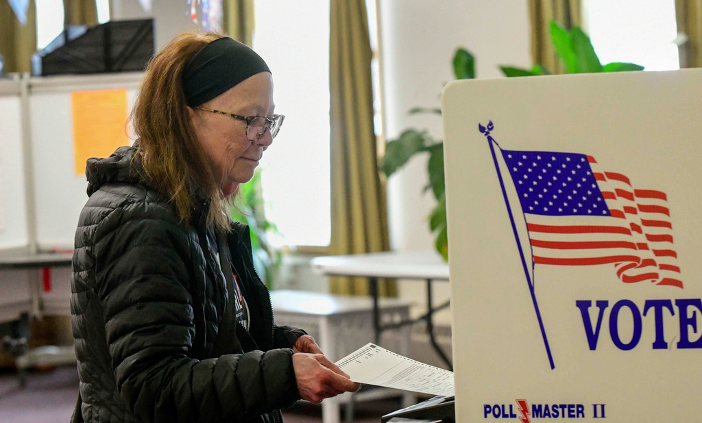 Kathleen Nutter of Wilmington, Vt., casts her ballot at the polling station in Wilmington, during Town Meeting Day in Vermont, Tuesday, March 3, 2026. (Kristopher Radder/The Brattleboro Reformer via AP)