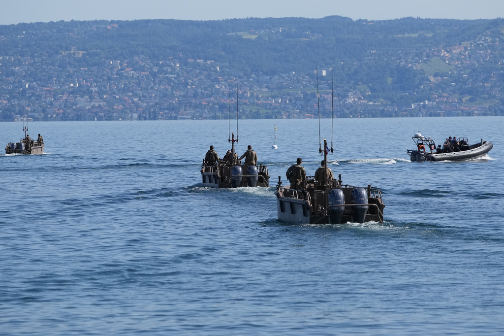 France's National Gendarmerie boats patrol on Lake Geneva ahead of the G7 summit in Evian-les-Bains, France, Monday, June 15, 2026. (AP Photo/Christophe Ena)