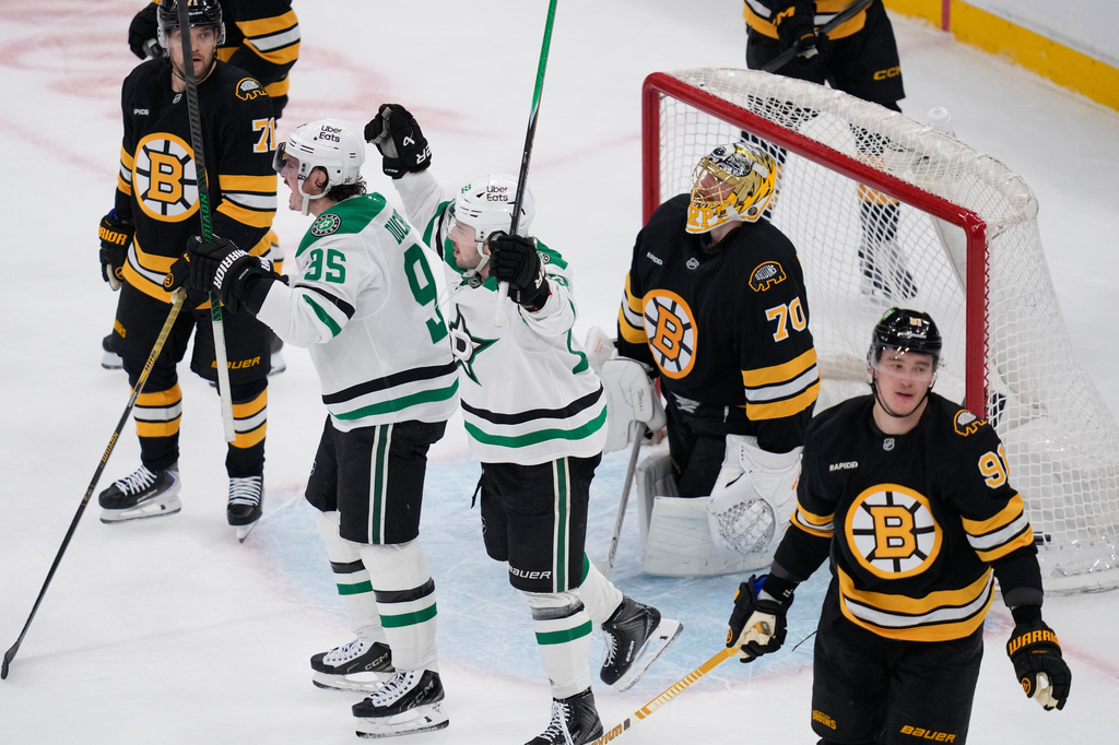 Dallas Stars center Matt Duchene (95) celebrates after his goal against Boston Bruins goaltender Joonas Korpisalo (70) during the second period of an NHL hockey game, Tuesday, March 31, 2026, in Boston. (AP Photo/Charles Krupa)