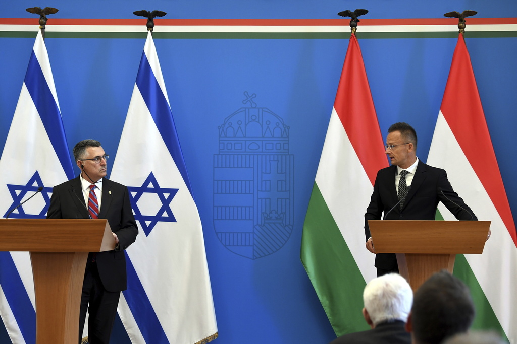 Hungarian Minister of Foreign Affairs and Trade Peter Szijjarto, right, and Israel's Foreign Minister Gideon Sa'ar hold a joint press conference in Szijjarto's office in Budapest, Hungary, Monday, Sept. 8, 2025. (Attila Kovacs/MTI via AP)