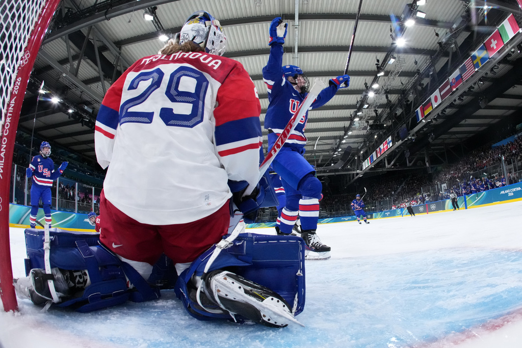 United States' Grace Zumwinkle, center, celebrates a goal during a preliminary round match of women's ice hockey between United States and Czechia at the 2026 Winter Olympics, in Milan, Italy, Thursday, Feb. 5, 2026. (Sun Fei/Pool Photo via AP)