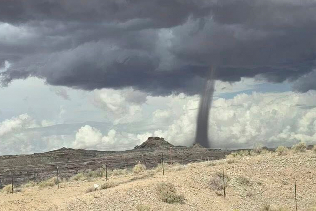 In this photo released by the Navajo Police Department, a tornado funnel is seen Sat., Sept. 13, 2025, northeast of Montezuma Creek, Utah. (Navajo Police Department via AP)