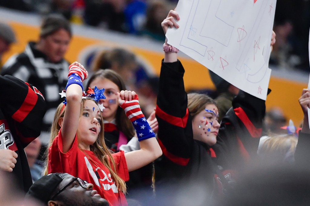 United States fans celebrate a goal during the second period of a Rivalry Series women's hockey game against Canada, Saturday, Nov. 8, 2025, in Buffalo, N.Y. (AP Photo/Adrian Kraus)