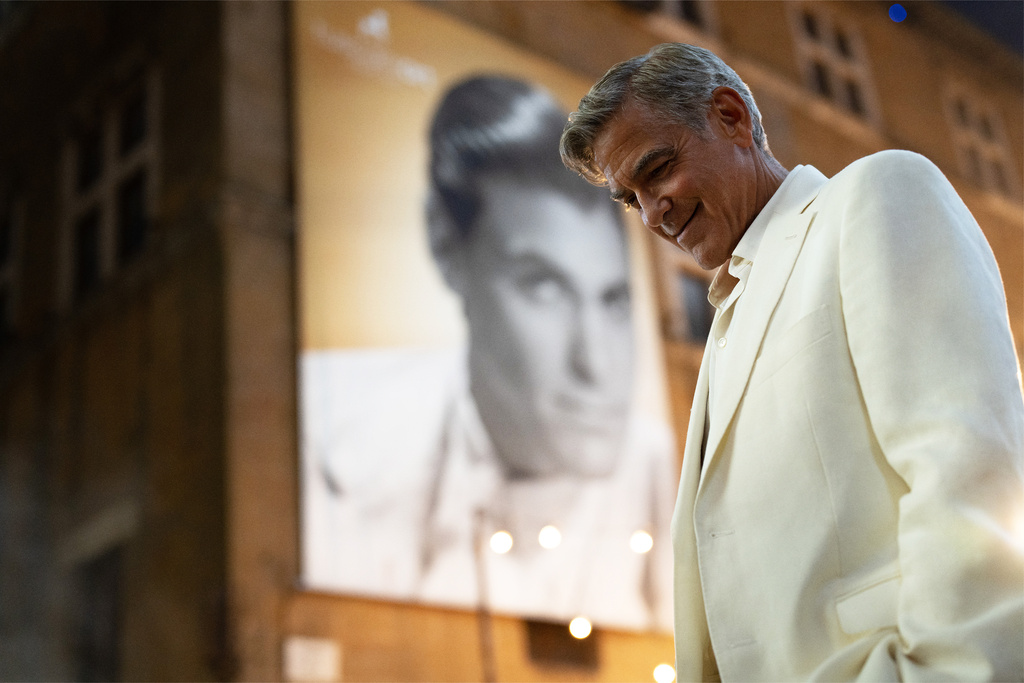 This image released by Netflix shows George Clooney in a scene from "Jay Kelly." (Peter Mountain/Netflix via AP)