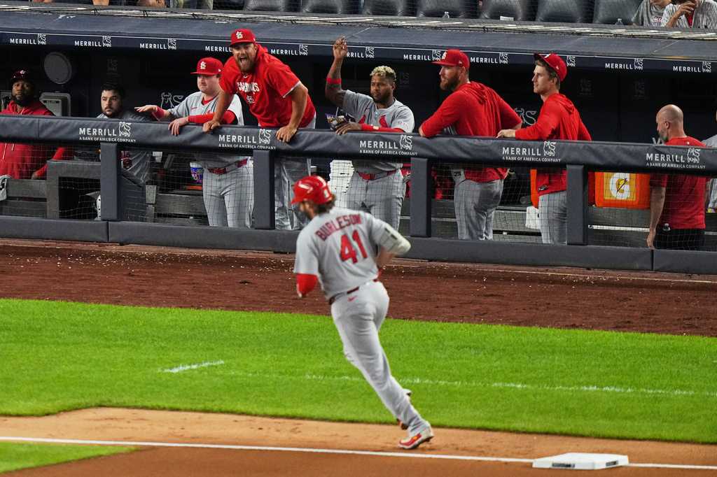 St. Louis Cardinals players celebrates as Alec Burleson (41) runs the bases after hitting a two-run home run during the fourth inning of a baseball game against the New York Yankees Monday, Aug. 3, 2026, in New York. (AP Photo/Frank Franklin II)