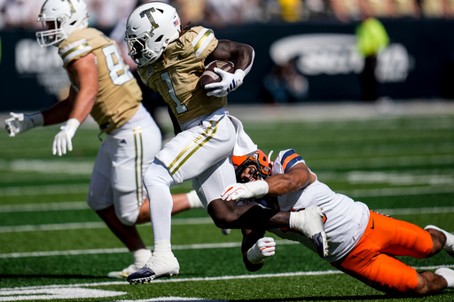 Georgia Tech running back Jamal Haynes (1) runs against Syracuse linebacker Gary Bryant III (13) during the first half of an NCAA college football game, Saturday, Oct. 25, 2025, in Atlanta. (AP Photo/Mike Stewart) Georgia Tech running back Jamal Haynes (1) runs against Syracuse linebacker Gary Bryant III (13) during the first half of an NCAA college football game, Saturday, Oct. 25, 2025, in Atlanta. (AP Photo/Mike Stewart)