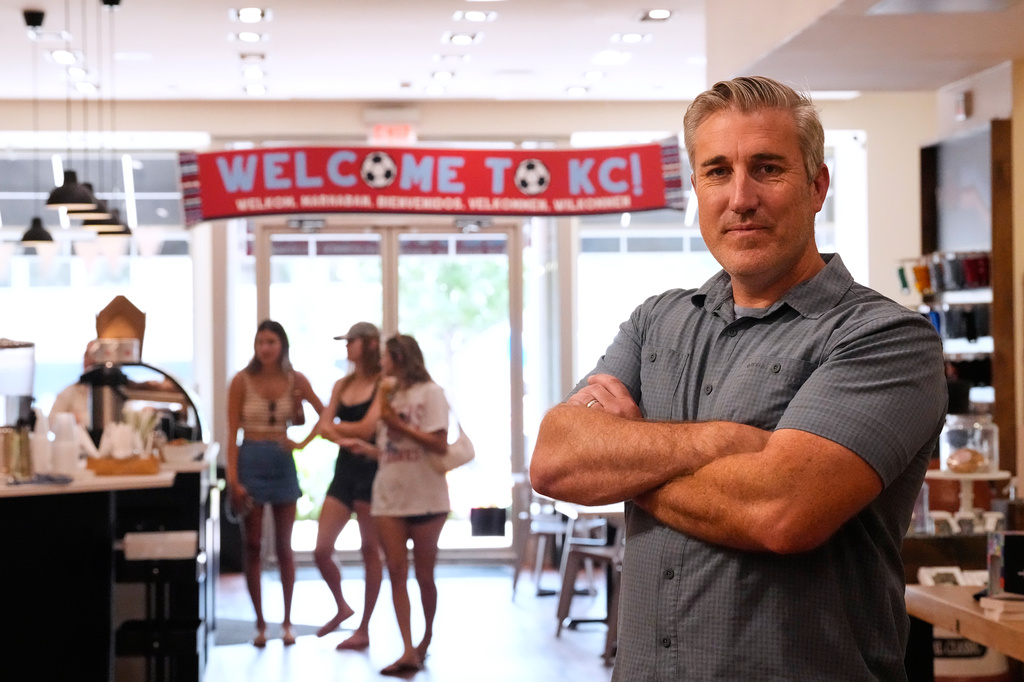 Made in Kansas City owner Keith Bradley has seen an influx of customers for his business as soccer fans have flocked to the city which is hosting FIFA World Cup soccer games Monday, June 29, 2026, in Kansas City, Mo. (AP Photo/Charlie Riedel) CORRECTS STATE TO MISSOURI FROM KANSAS