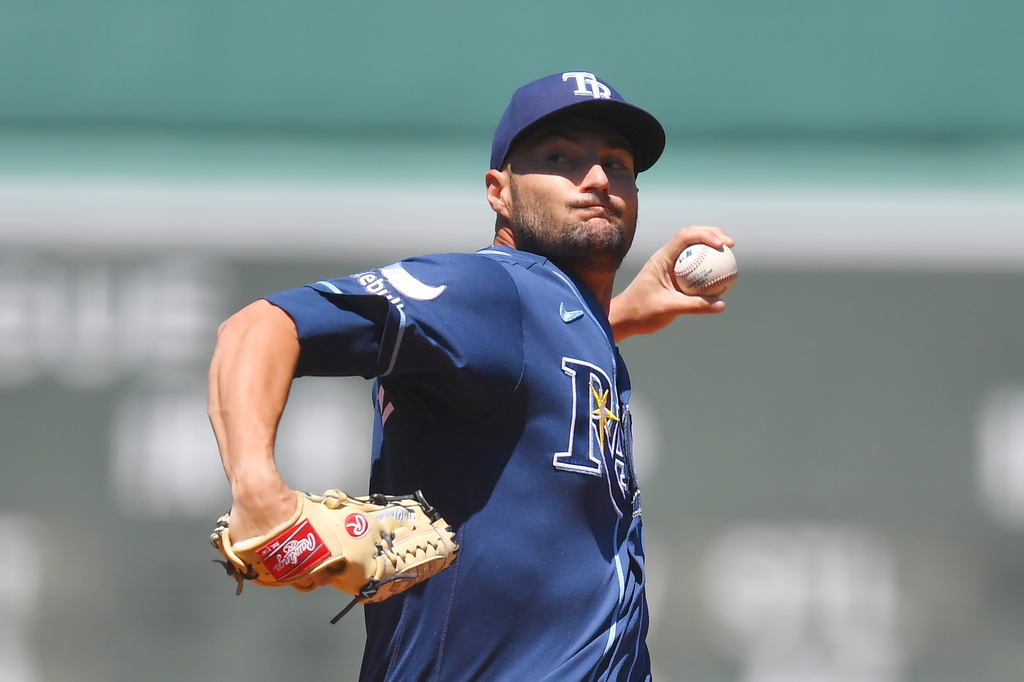Tampa Bay Rays' Shane McClanahan winds up for a pitch to a Boston Red Sox batter in the first inning of a baseball game, Sunday, July 19, 2026, in Boston. (AP Photo/Steven Senne)