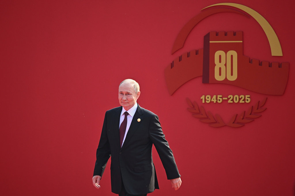 FILE - Russian President Vladimir Putin arrives at a military parade to commemorate the 80th anniversary of Japan's World War II surrender in Beijing, China, Sept. 3, 2025. (Sergei Bobylev, Sputnik, Kremlin Pool Photo via AP, File)
