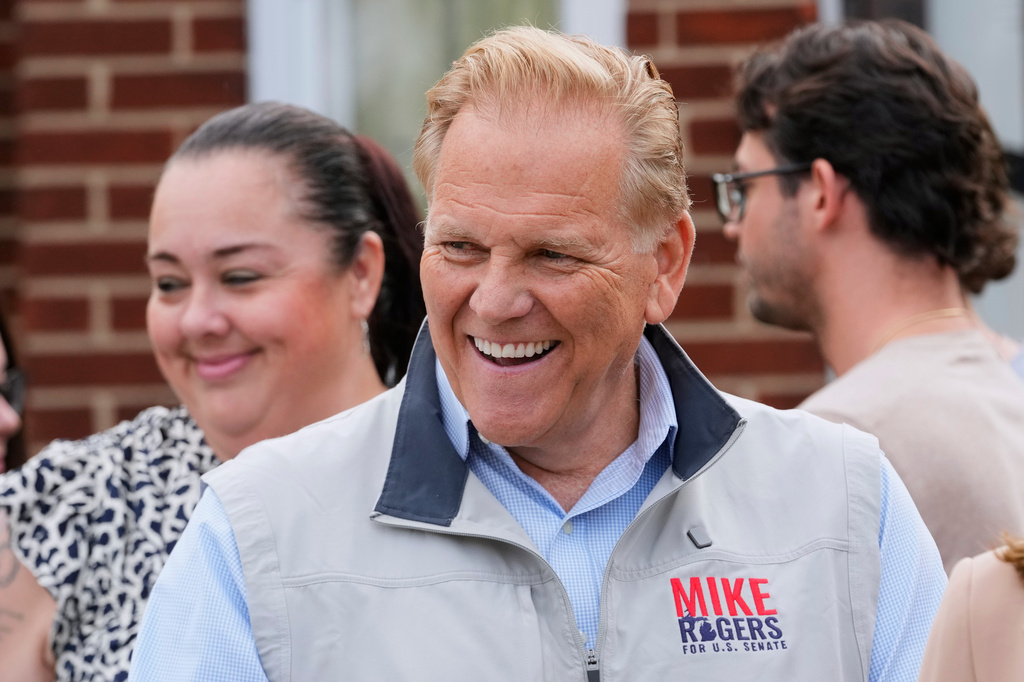 Republican nominee for U.S. Senate Mike Rogers smiles during a campaign event Thursday, Aug. 20, 2026, in Detroit. (AP Photo/Paul Sancya)