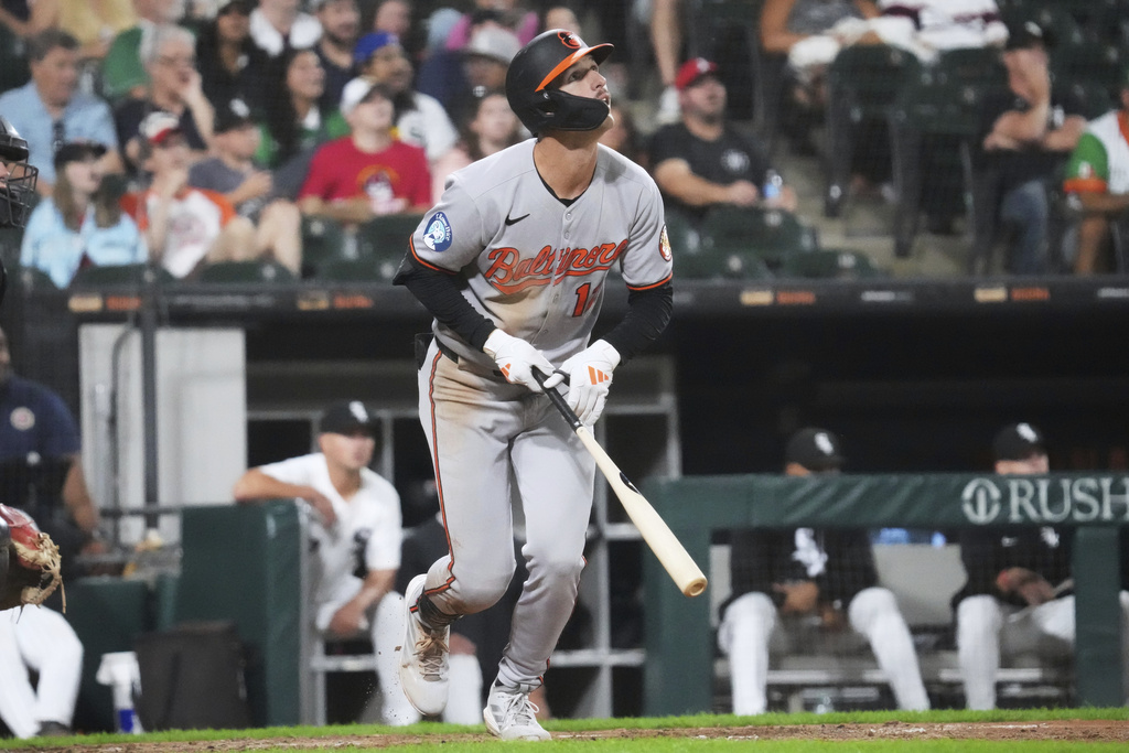 Baltimore Orioles' Dylan Beavers watches his two-run home run during the seventh inning of a baseball game against the Chicago White Sox in Chicago, Tuesday, Sept. 16, 2025. (AP Photo/Nam Y. Huh)