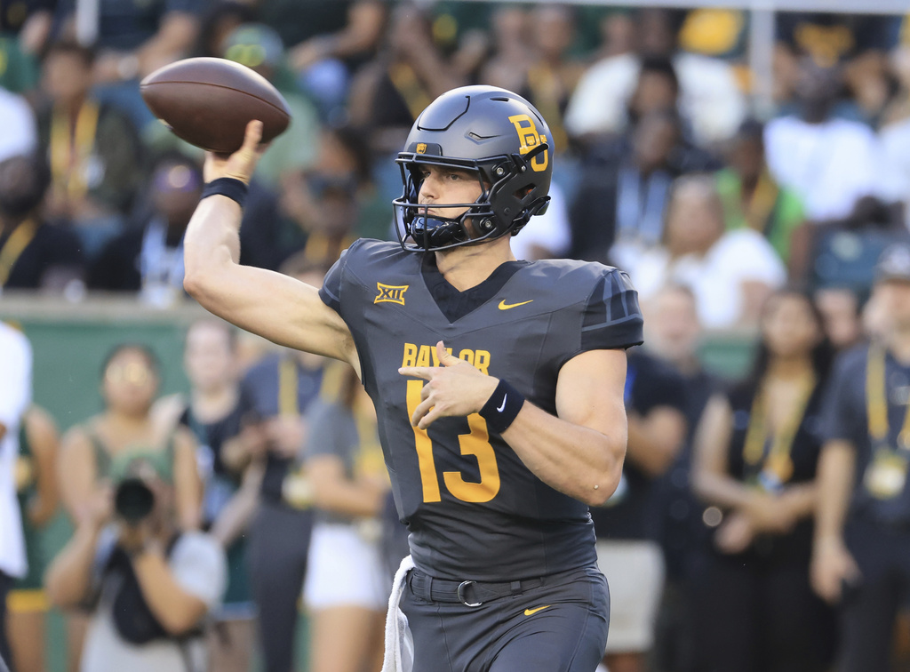 Baylor Sawyer Robertson quarterback passes the ball in the first half of an NCAA college football game against Arizona State, Saturday, Sept. 20, 2025, in Waco, Texas. (AP Photo/Jerry Larson)