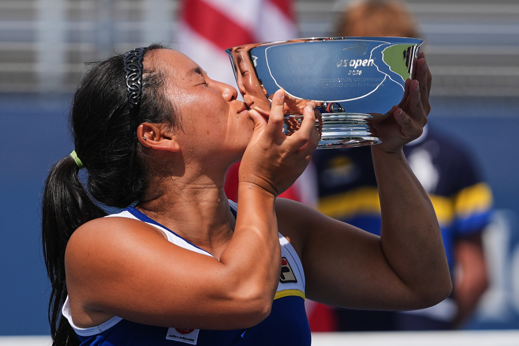 Yui Kamiji, of Japan, holds her trophy after winning the wheelchair women's singles final of the U.S. Open tennis championships against Diede de Groot, of the Netherlands, Saturday, Sept. 12, 2026, in New York. (AP Photo/Frank Franklin II)