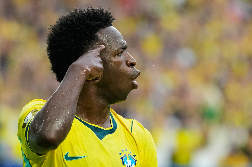 Brazil's Vinicius Junior (7) celebrates after scoring his team's second goal during the World Cup Group C soccer match between Scotland and Brazil in Miami Gardens, Fla., Wednesday, June 24, 2026. (AP Photo/Rebecca Blackwell)