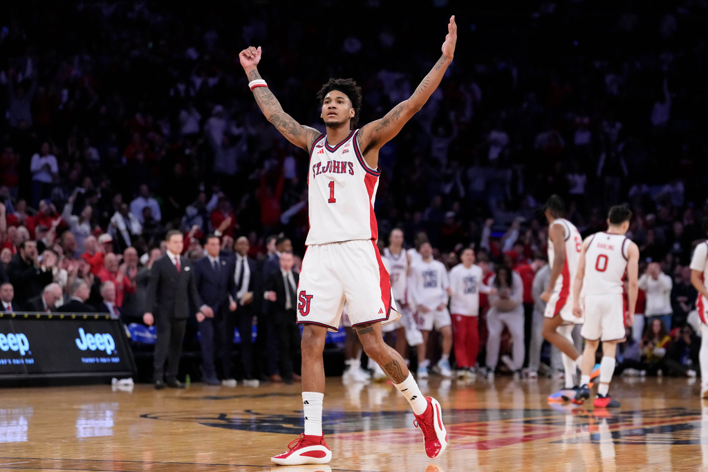 St. John's forward Dillon Mitchell (1) gestures during the second half of an NCAA college basketball game against UConn in the championship of the Big East tournament, Saturday, March 14, 2026, in New York. (AP Photo/Yuki Iwamura)