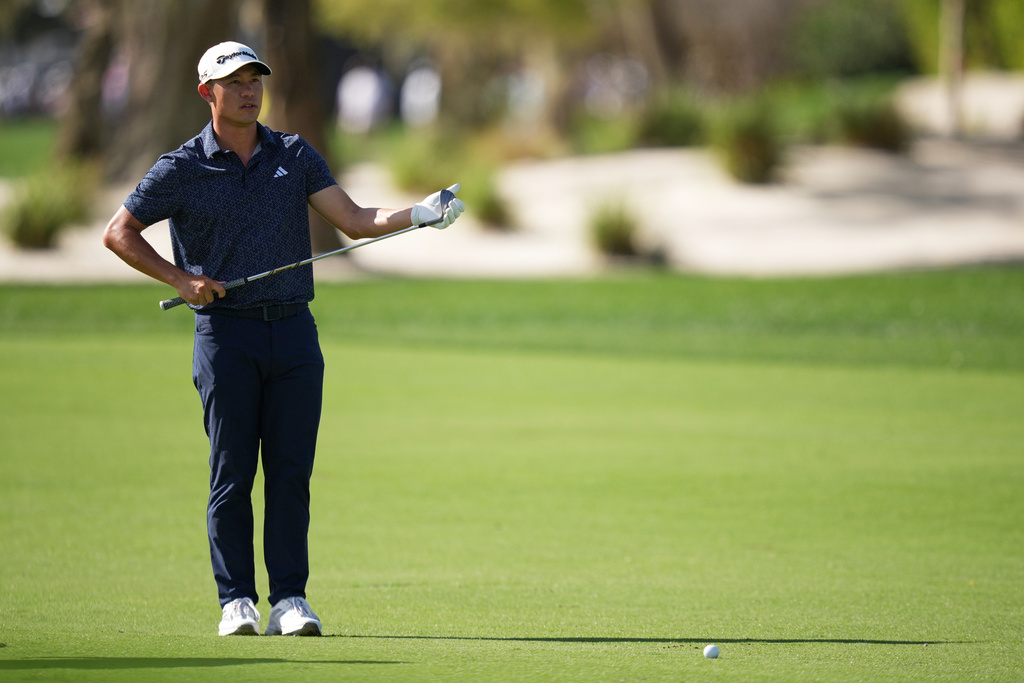 Collin Morikawa lines up hit shot on the first hole during the first round of the Arnold Palmer Invitational at Bay Hill golf tournament Thursday, March 5, 2026, in Orlando, Fla. (AP Photo/Matt Slocum)