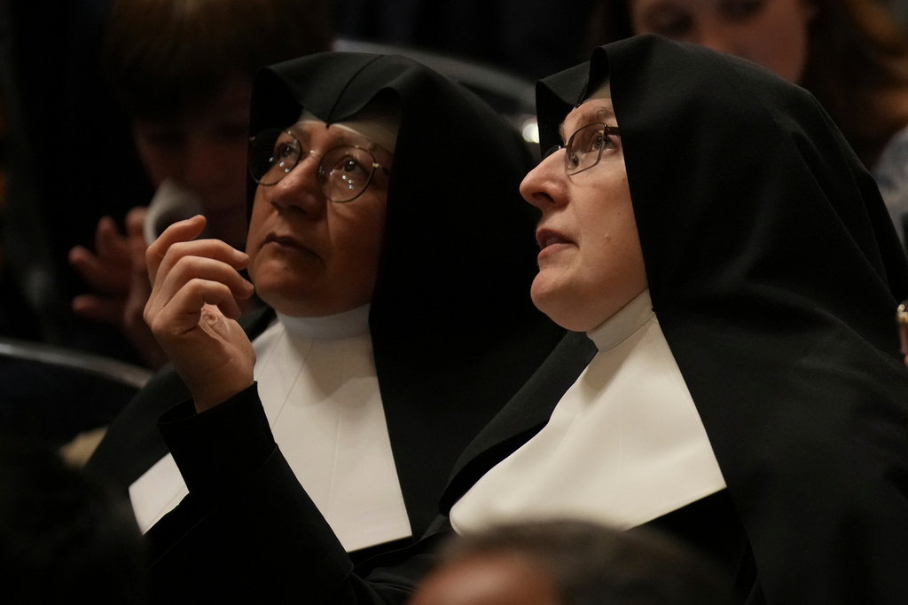 Nuns wait for Pope Leo XIV Easter Vigil inside St. Peter's Basilica at The Vatican, Saturday, April 4, 2026. (AP Photo/Andrew Medichini)