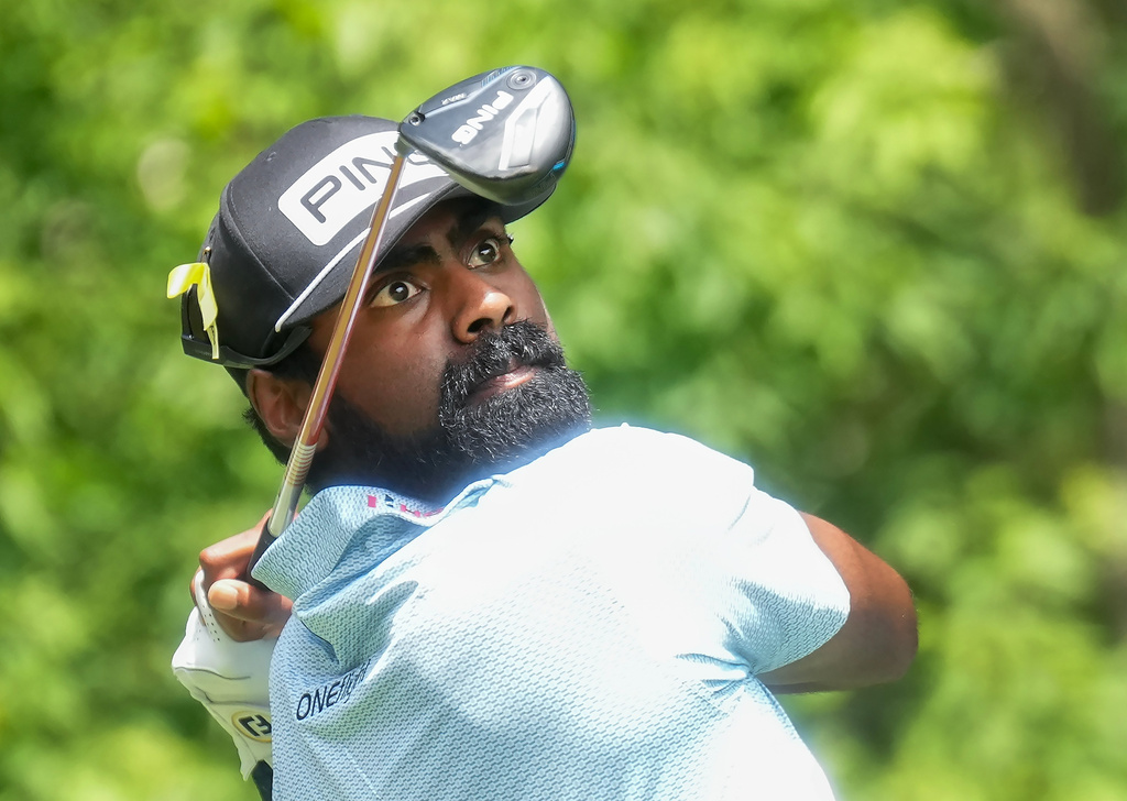 Sahith Theegala hits his tee shot on the eighth hole during the first round of the Canadian Open golf tournament in Caledon, Ontario, Thursday, June 11, 2026. (Nathan Denette/The Canadian Press via AP)