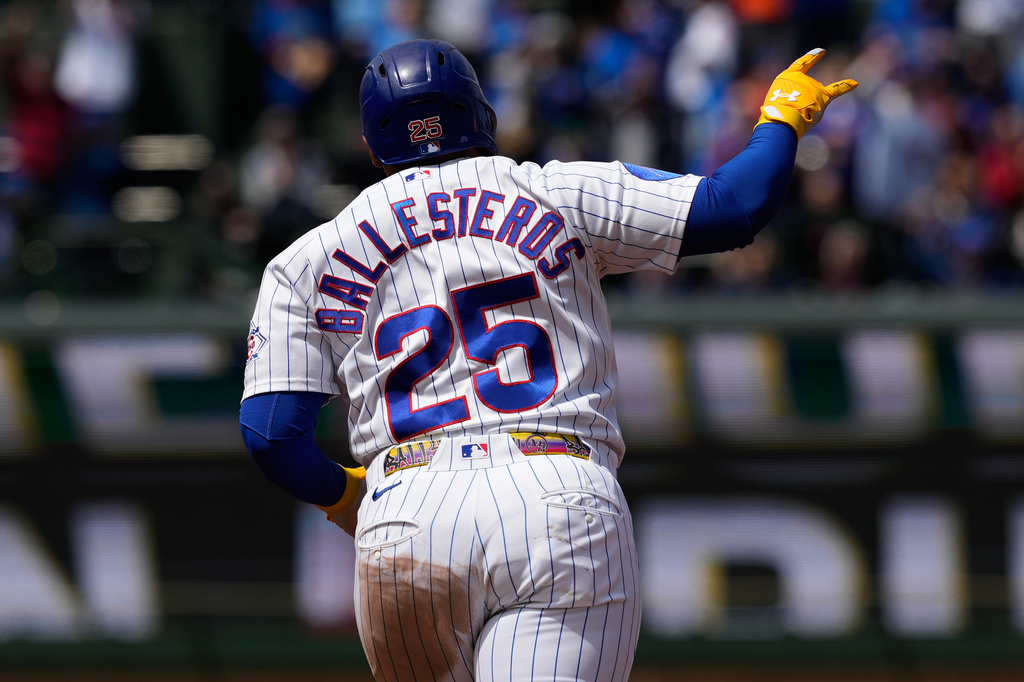 Chicago Cubs' Moisés Ballesteros celebrates as he rounds the bases after hitting a two-run home run during the third inning of a baseball game against the Arizona Diamondbacks in Chicago, Sunday, May 3, 2026. (AP Photo/Nam Y. Huh)