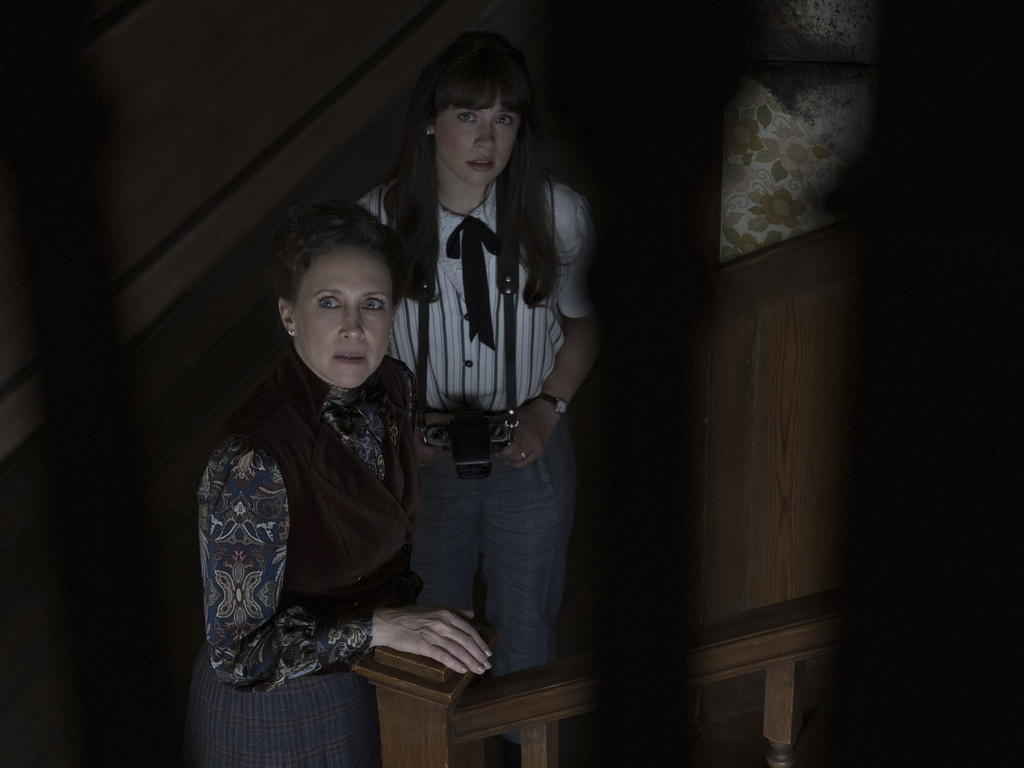 This image released by Warner Bros. Pictures shows Vera Farmiga, left, and Mia Tomlinson in a scene from "The Conjuring: Last Rights." (Warner Bros. Pictures via AP)