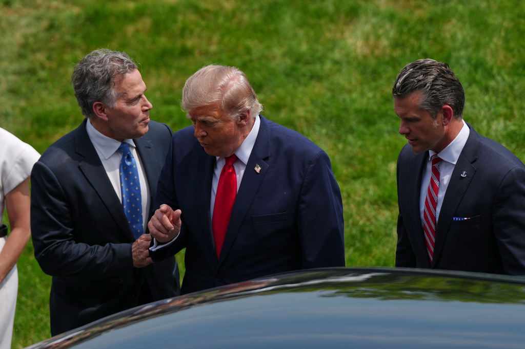 President Donald Trump walks with Sen. Dave McCormick, R-Pa., and Defense Secretary Pete Hegseth as he arrives at the United States Army War College in Carlisle, Pa., for the Pennsylvania Defense and Innovation Summit, Wednesday, July 15, 2026. (AP Photo/Julia Demaree Nikhinson)