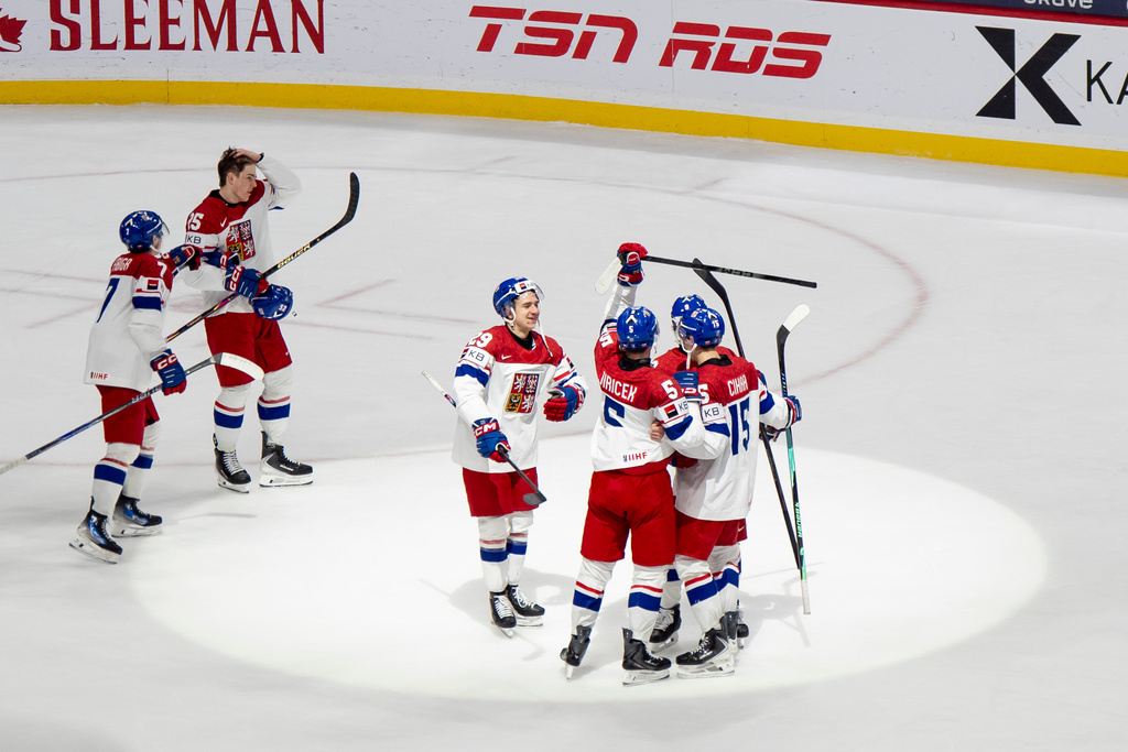 Team Czechia players celebrate after defeating Canada in an IIHF World Junior Hockey Championship semifinals game in St. Paul, Minn., Sunday, Jan. 4, 2026. (Christopher Katsarov/The Canadian Press via AP)