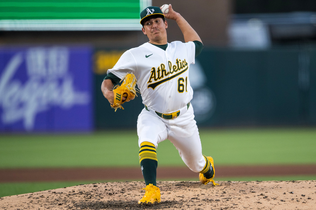 Athletics pitcher Gage Jump (61) throws during the sixth inning of a baseball game against the Los Angeles Angels in West Sacramento, Calif., Thursday, June 18, 2026. (AP Photo/Nic Coury)