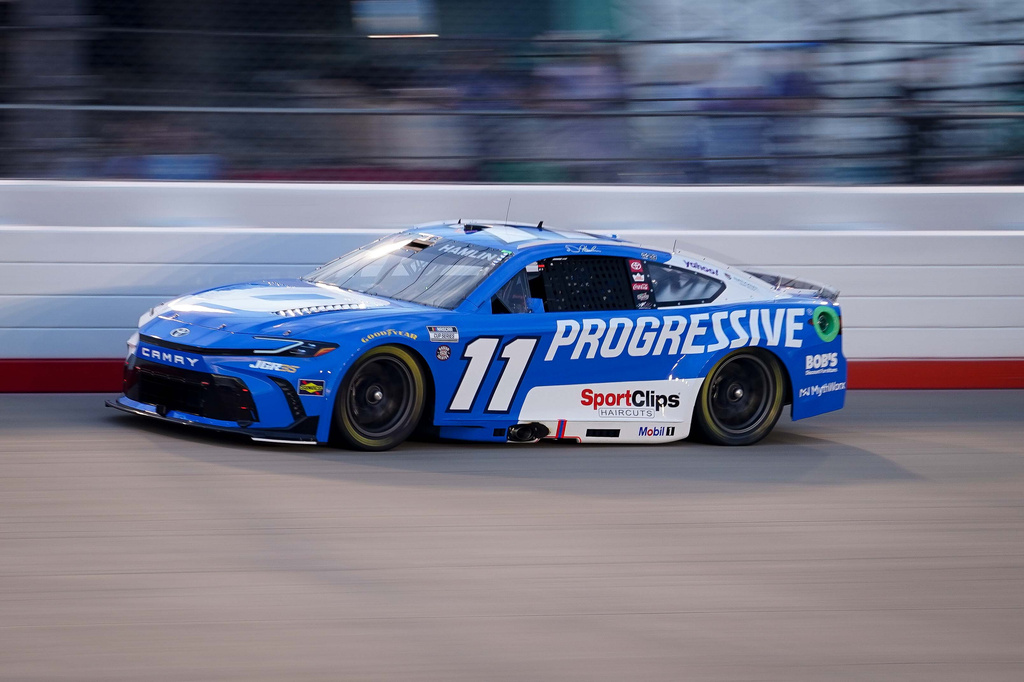 Denny Hamlin speeds around the track during a NASCAR Cup Series auto race, Sunday, May 31, 2026, in Lebanon, Tenn. (AP Photo/Camden Hall)