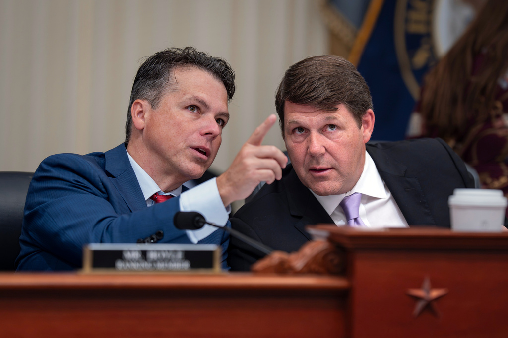 House Budget Committee Chairman Jodey Arrington, R-Texas, right, speaks with Rep. Brendan Boyle, D-Pa., the ranking member, during a markup on the Fiscal Year 2027 spending plan, at the Capitol in Washington, Thursday, July 16, 2026. (AP Photo/J. Scott Applewhite)