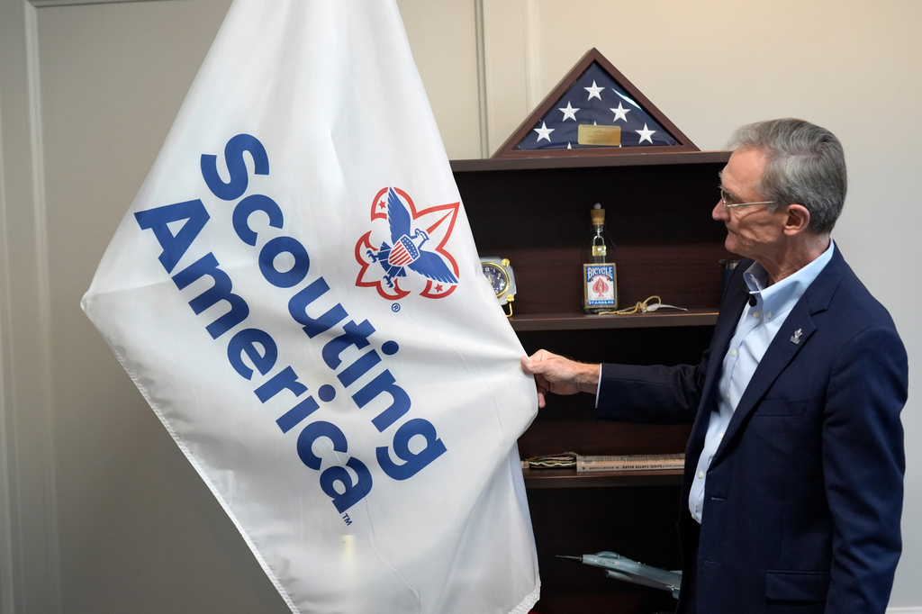 FILE - Roger Krone, chief executive officer of Scouting America, describes the design of the organization's flag in Irving, Texas, Feb. 5, 2025. (AP Photo/LM Otero, File)