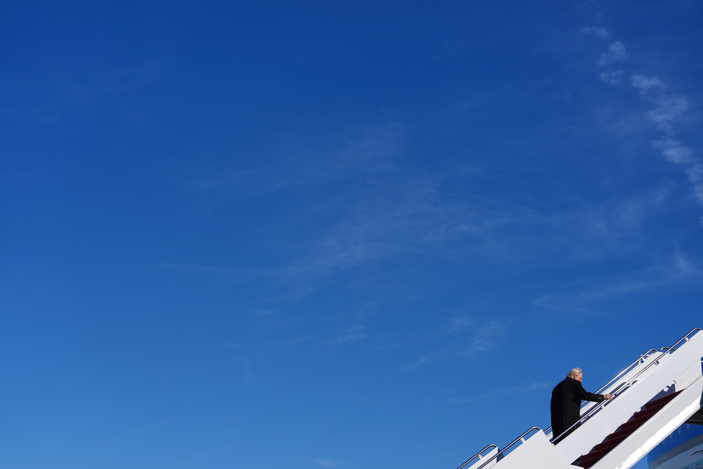 President Donald Trump boards Air Force One for a trip to Detroit, Tuesday, Jan. 13, 2026, in Joint Base Andrews, Md. (AP Photo/Evan Vucci)