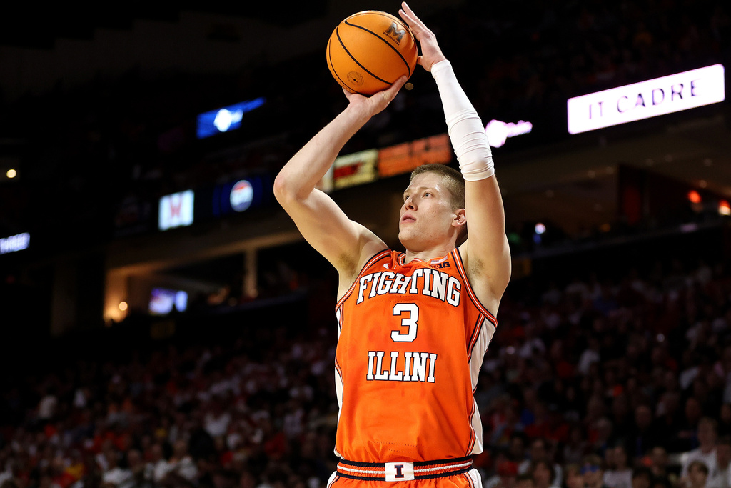 Illinois forward Ben Humrichous takes a shot during the first half of an NCAA college basketball game against Maryland, Sunday, March 8, 2026, in College Park, Md. (AP Photo/Daniel Kucin Jr.)