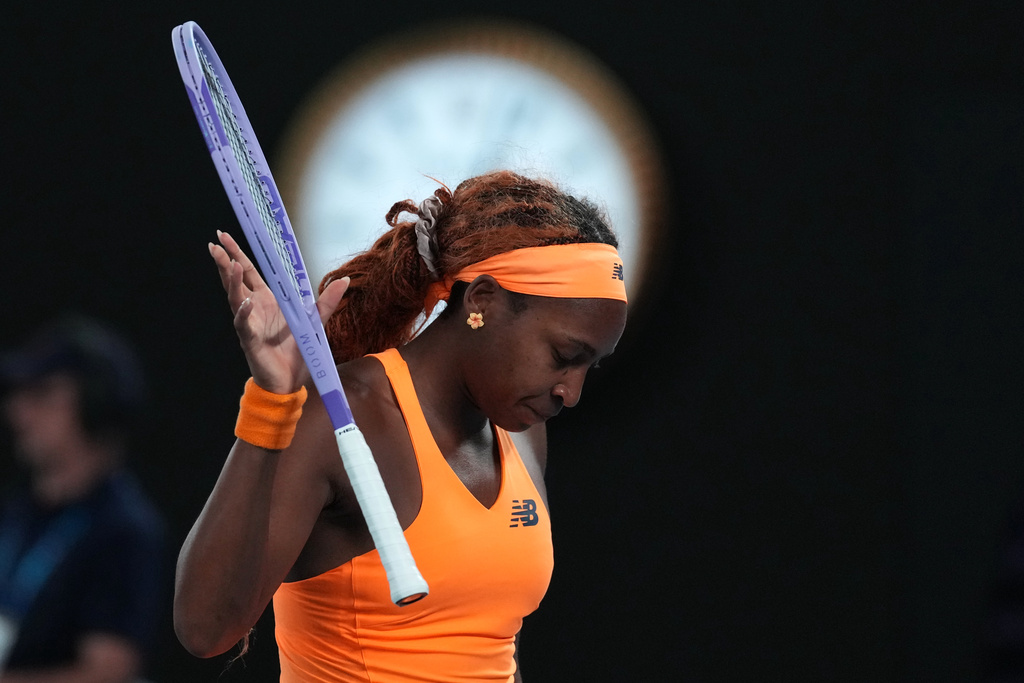 Coco Gauff of the U.S. reacts during her quarterfinal match against Elina Svitolina of Ukraine during their quarterfinal match at the Australian Open tennis championship in Melbourne, Australia, Tuesday, Jan. 27, 2026. (AP Photo/Dita Alangkara)
