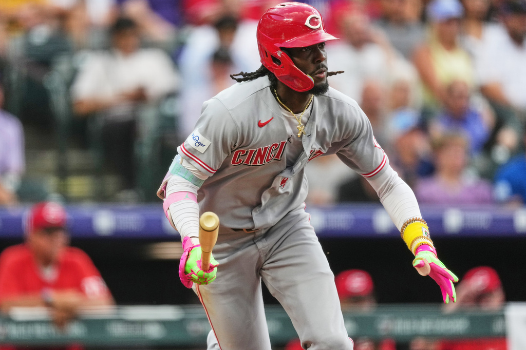 Cincinnati Reds' Elly de la Cruz heads up the first-base line after hitting a single off Colorado Rockies starting pitcher Gabriel Hughes in the fifth inning of a baseball game Friday, July 17, 2026, in Denver. (AP Photo/David Zalubowski)