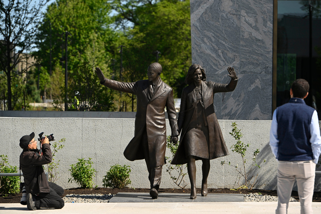 Statues of former President Barack Obama and former First Lady Michelle Obama at the Obama Presidential Center in Chicago, Thursday, May 28, 2026. (AP Photo/Paul Beaty)