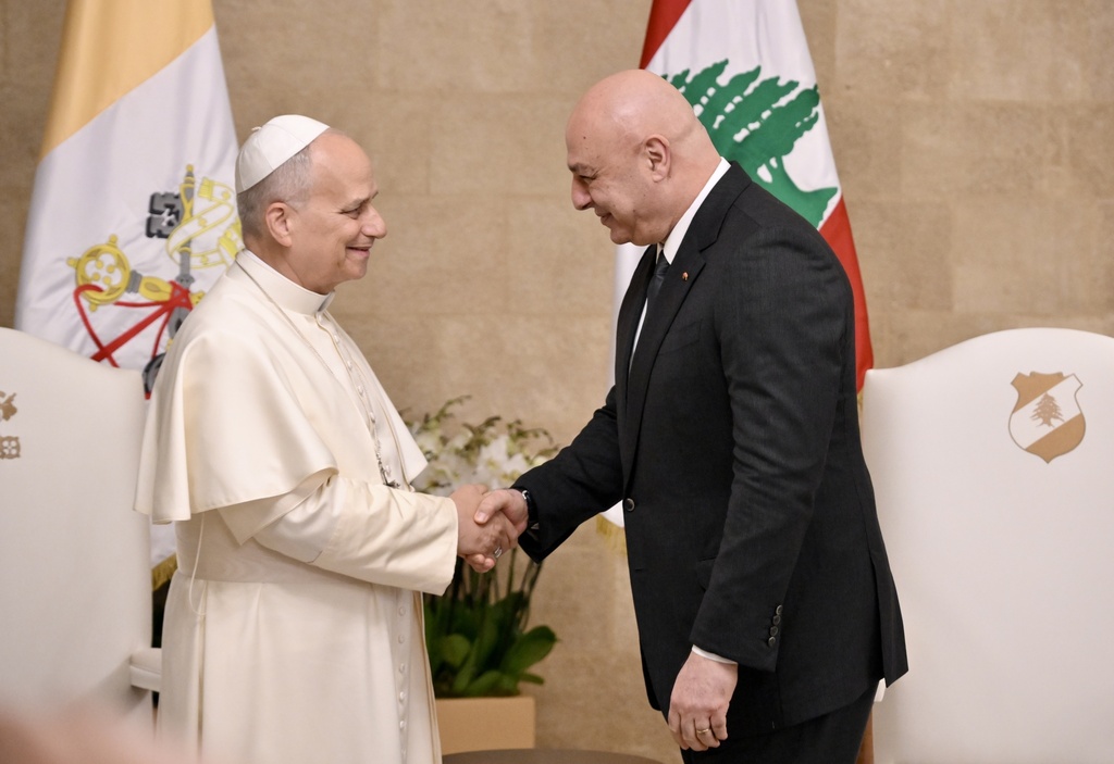Pope Leo XIV is greeted by Lebanese President Joseph Aoun upon his arrival at the Presidential Palace in Beirut, Lebanon, Sunday, Nov. 30, 2025. (Alessandro Di Meo/Pool Via AP)