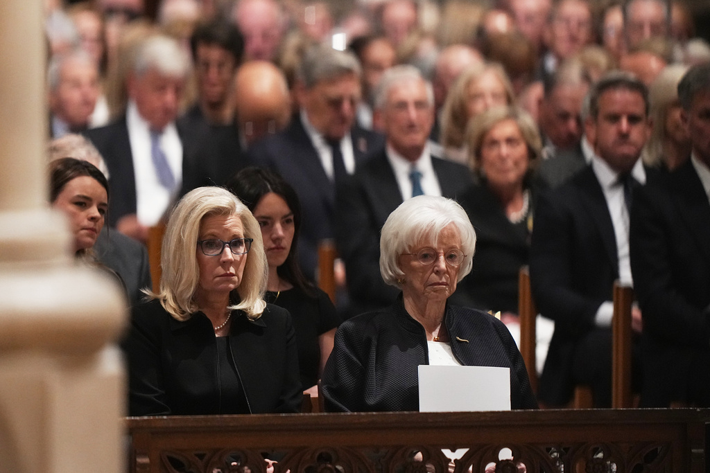 Lynne Cheney, seated front right, and daughter Liz Cheney, seated front left, look on during the funeral for former Vice President Dick Cheney at the Washington National Cathedral on Thursday, Nov. 20, 2025 in Washington. (AP Photo/Matt Rourke)